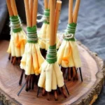 Just some appetizer sticks and slices of cheese to make these Halloween broomsticks. 3 just some appetizer sticks and slices of cheese to 2025 09 10 170404 150x150 1