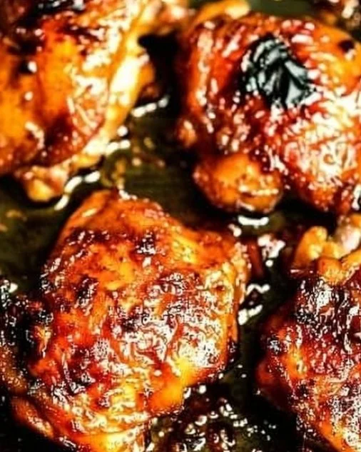 Juicy oven baked boneless skinless chicken thighs served on a plate