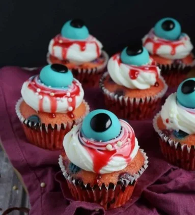 Creepy Halloween Eyeball Cupcakes 2 Creepy Halloween Eyeball Cupcakes decorated with edible eyes and icing