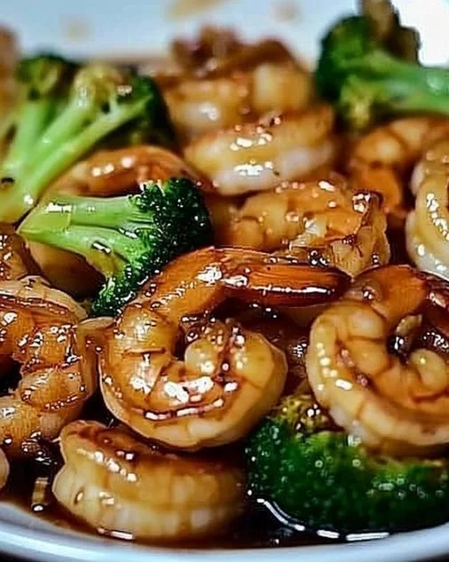 High-Protein Honey Garlic Shrimp 2 Delicious high-protein honey garlic shrimp dish served with vegetables.