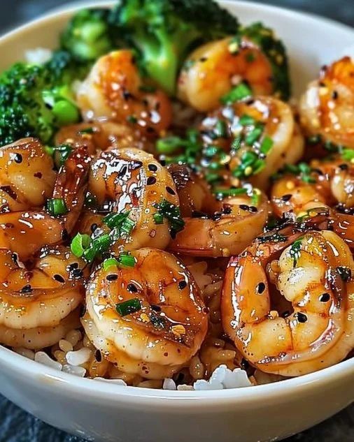 Honey Garlic Shrimp Bowls 2 Honey Garlic Shrimp Bowls with vibrant vegetables and rice.