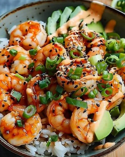 Shrimp rice bowl with spicy mayo and fresh vegetables