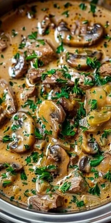 Delicious Beef Stroganoff served on a plate with fresh parsley garnish