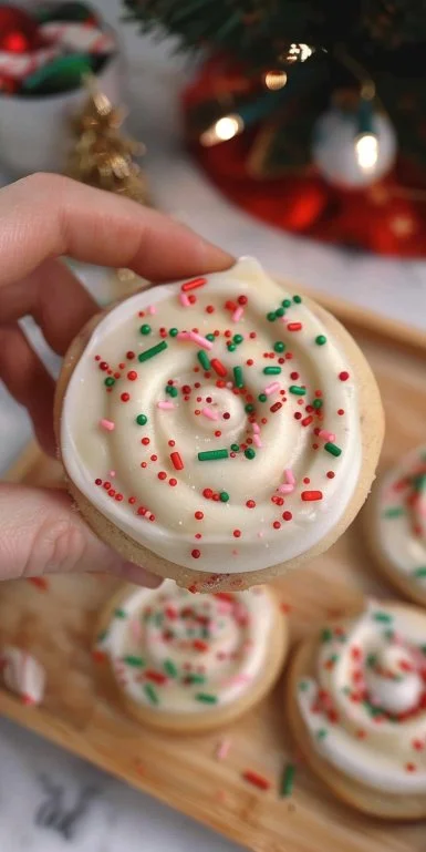 Decorated Christmas sugar cookies inspired by Crumbl recipe.