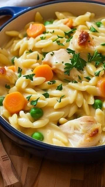 Creamy chicken pot pie orzo served in a bowl