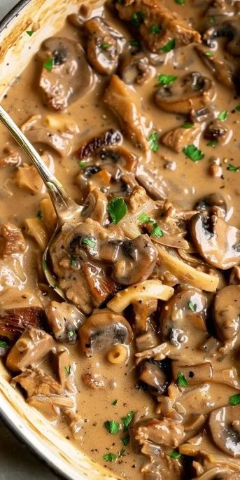 Easy Beef Stroganoff 3 Delicious bowl of easy Beef Stroganoff with noodles and fresh herbs