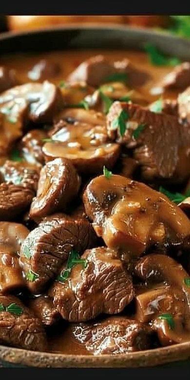 Easy Beef Stroganoff with tender beef in creamy sauce served over noodles