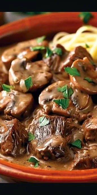 Delicious homemade easy beef stroganoff served with egg noodles