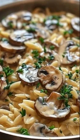 One-Pot Creamy Mushroom Orzo 3 Delicious one-pot creamy mushroom orzo garnished with fresh herbs