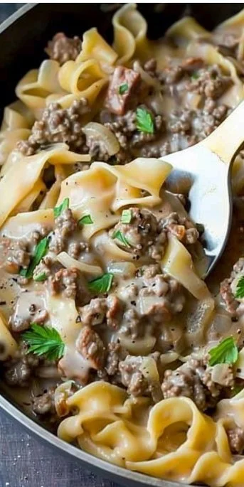 Delicious plate of rich and creamy ground beef stroganoff with noodles