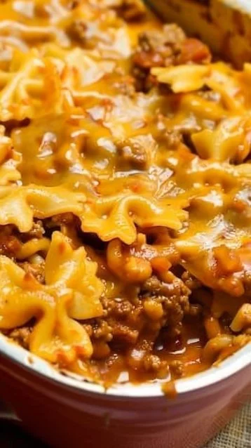 Sloppy Joe Casserole 3 Delicious Sloppy Joe Casserole served in a baking dish with toppings