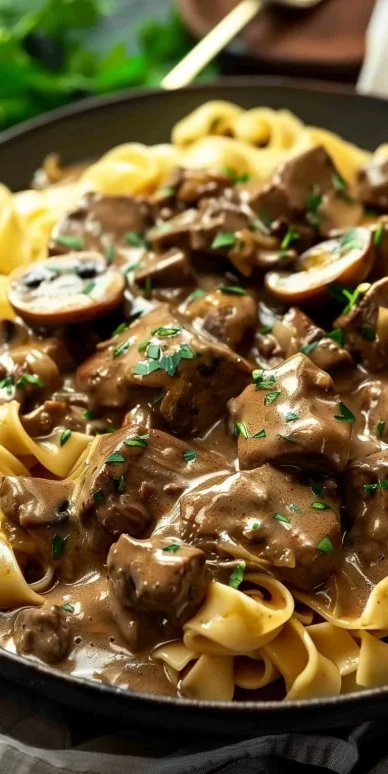 Delicious plate of authentic classic beef stroganoff with mushrooms and creamy sauce