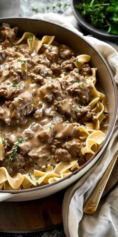 Delicious Beef Stroganoff served with noodles and garnished with parsley