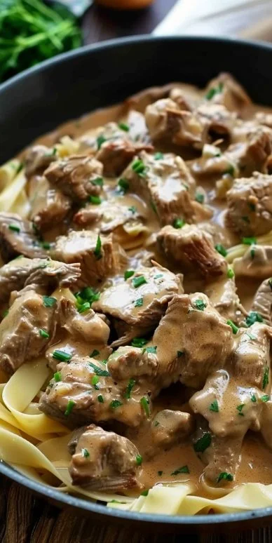 Delicious plate of Beef Stroganoff with mushrooms and creamy sauce