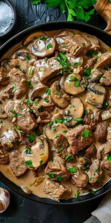 Plate of creamy Beef Stroganoff with mushrooms and noodles