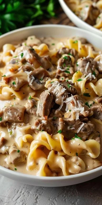 Creamy beef stroganoff casserole served in a baking dish