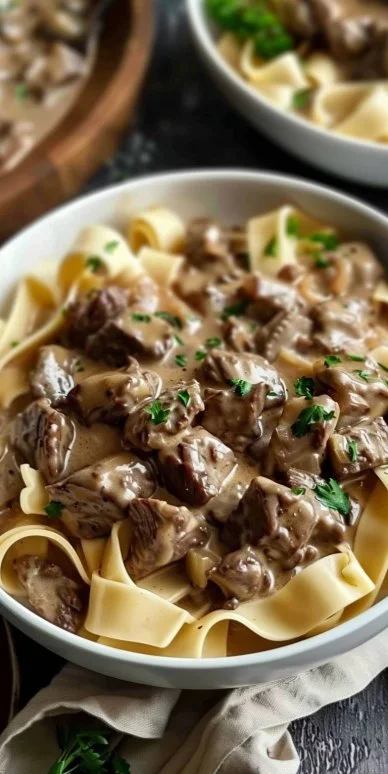 Delicious Easy Beef Stroganoff served with noodles and garnished with parsley
