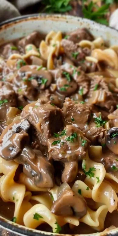 Delicious easy Beef Stroganoff served over egg noodles with mushrooms