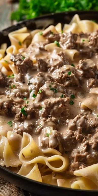 A delicious plate of easy ground beef stroganoff served with noodles.