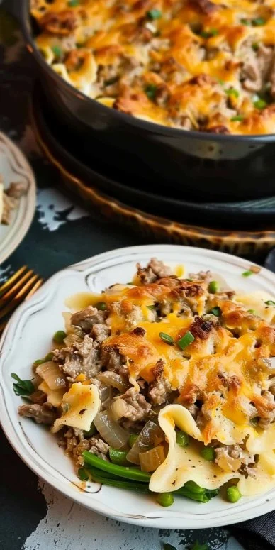 French onion ground beef stroganoff casserole topped with cheese