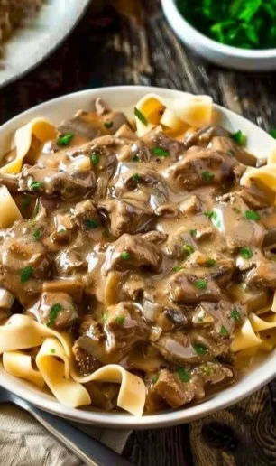 Ground Beef Stroganoff 4 Delicious ground beef stroganoff served with egg noodles and garnished with parsley.