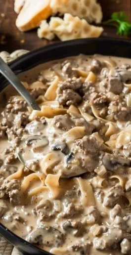 Delicious Ground Beef Stroganoff served with pasta and garnished with parsley