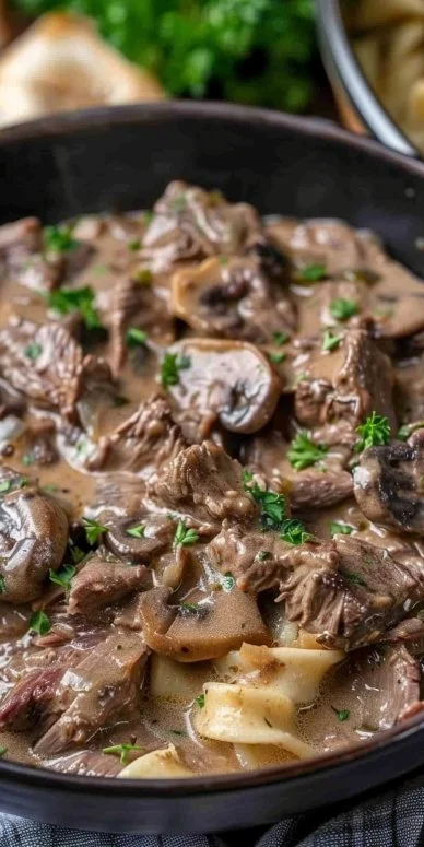 Slow Cooker Beef Stroganoff 4 Delicious slow cooker beef stroganoff served over noodles