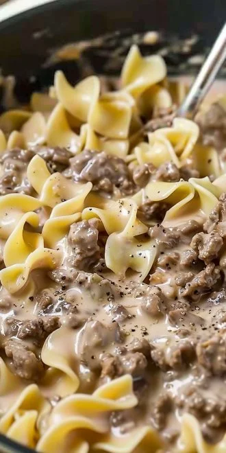 Delicious 30-Minute Ground Beef Stroganoff served with pasta and creamy sauce