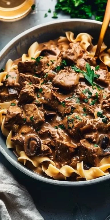 Delicious Beef Stroganoff served with pasta, featuring tender beef and creamy sauce