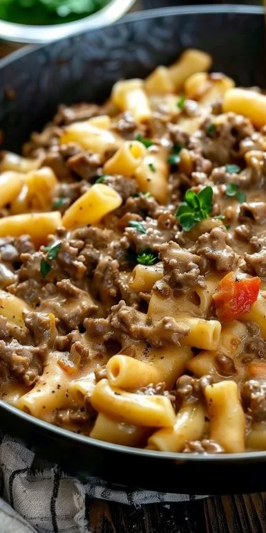 Delicious Beef Stroganoff Hamburger Helper served in a bowl with herbs