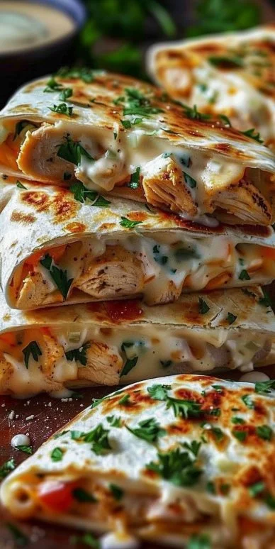 Cheesy garlic chicken wraps filled with tender chicken and cheese