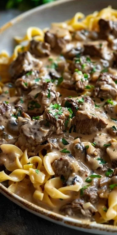 Delicious and creamy Beef Stroganoff served with egg noodles