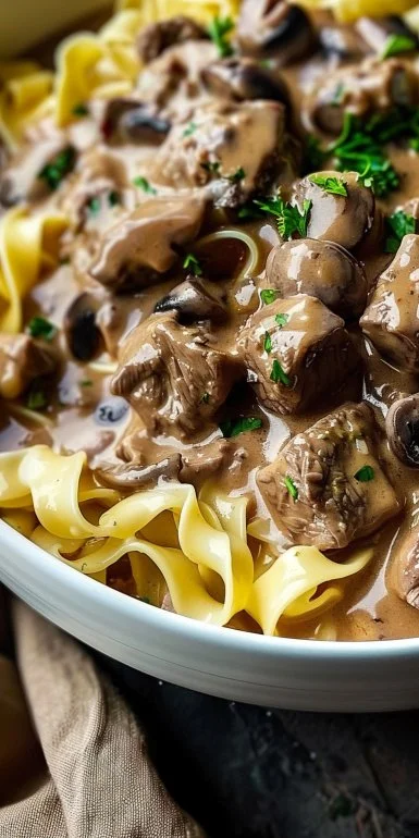 Crock Pot Stroganoff Creamy Comfort Food 4 Delicious Crock Pot Stroganoff served in a bowl with creamy sauce and garnished with parsley
