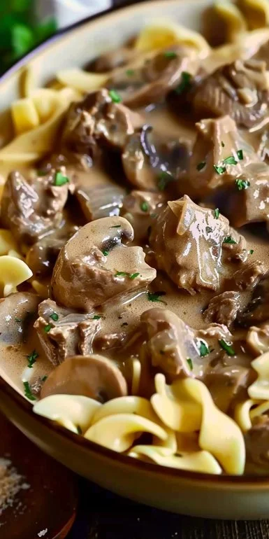 Easy Crock Pot Beef Stroganoff Slow Cooker 4 Creamy Easy Crock Pot Beef Stroganoff served with noodles