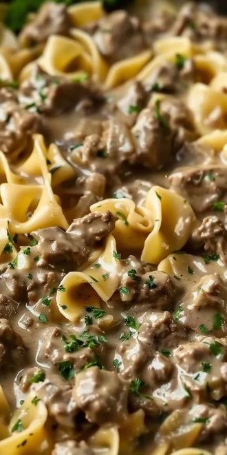 Creamy Ground Beef Stroganoff served over egg noodles