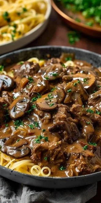Hearty beef and mushroom stroganoff served in a bowl