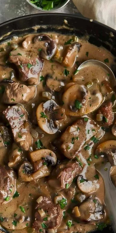 Ina Garten Beef Stroganoff 4 Delicious plate of Ina Garten's Beef Stroganoff served with noodles.