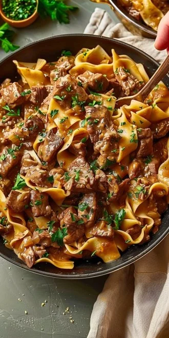 One-Pot Beef Stroganoff served in a bowl with mushrooms and egg noodles