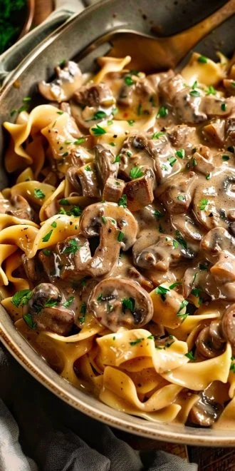 Delicious quick beef stroganoff with mushrooms served on a plate