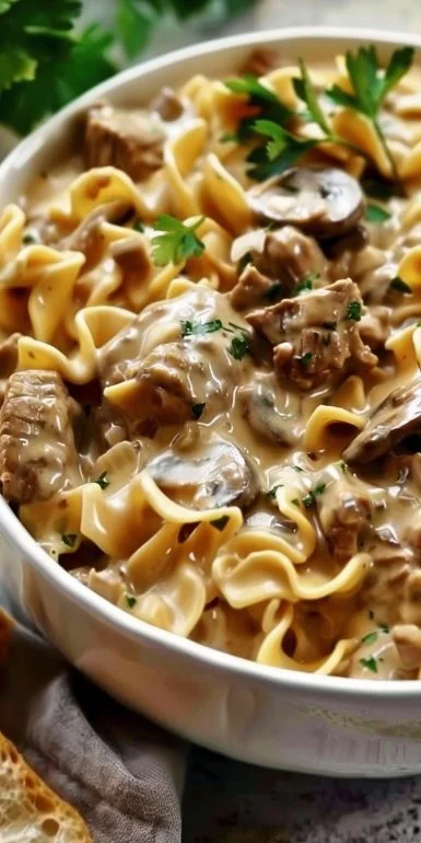 Delicious slow cooker beef stroganoff with tender beef and creamy sauce