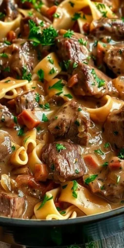 Slow cooker beef stroganoff with mushrooms and creamy sauce served in a bowl