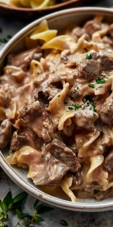 World's Best Beef Stroganoff 4 Delicious bowl of world's best beef stroganoff garnished with parsley