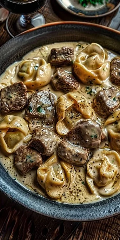 Creamy Cracked Garlic Steak Tortellini served in a delicious sauce